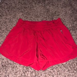 red lululemon shorts